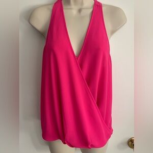 Naked Zebra-sleeveless blouse, unique back, size small.